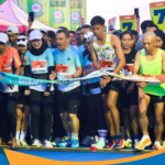 Ahmad Luthfi memakai baju olahraga lari di kategori 5K Purwokerto