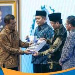 Buku modul panduan kurikulum koperasi sekolah untuk guru di Jawa Tengah.